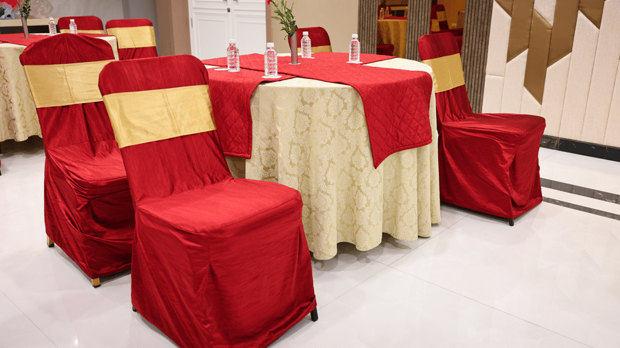 A close view of banquet chairs and tables in Coronet Ball Room at The Monarch Hotel, Brigade Road arranged for a seated event.
