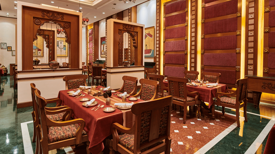 Fine dining restaurant interior at The Ummed Ahmedabad
