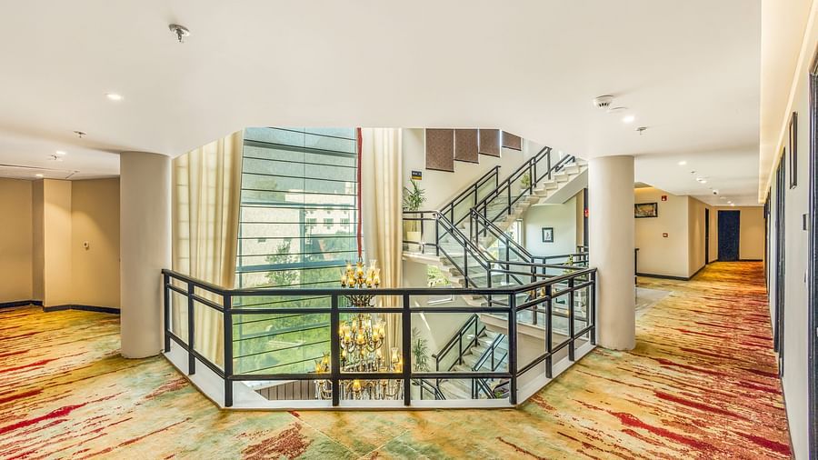 The Vaishnodevi Sarovar Portico room corridor and staircase