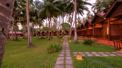 a row of cottages and the lawn at Sea Princess Beach Resort, Port Blair