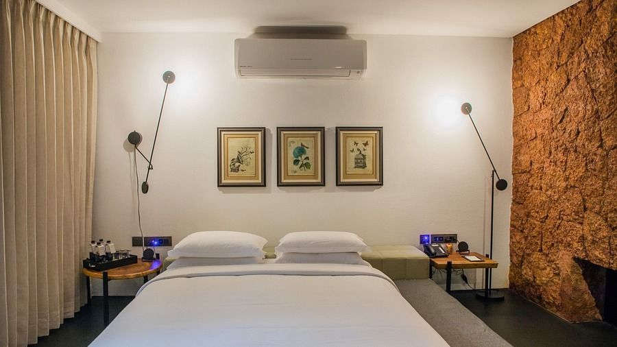 Double bed with white sheets