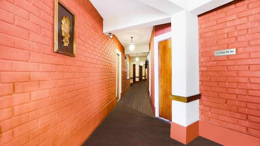 A hallway that leads to various rooms | Summit Newa Regency & Spa, Pelling