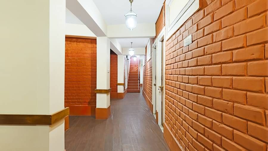 A hallway that leads to various rooms | Summit Newa Regency & Spa, Pelling