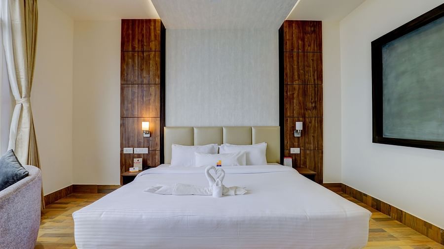 view of king size bed and TV of a Deluxe Room Banari Regency by Summit, Namchi
