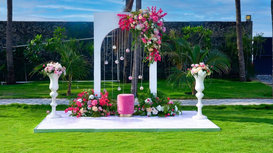 A decorated space with flowers & lights at the lawn at Grande Bay Resort & Spa.