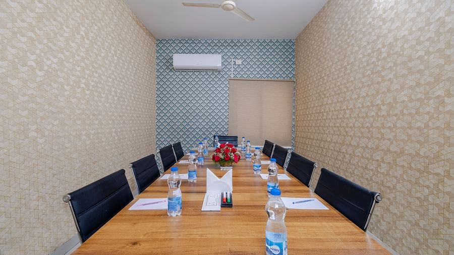 Boardroom setup with table and seating at Lemonridge Hotels
