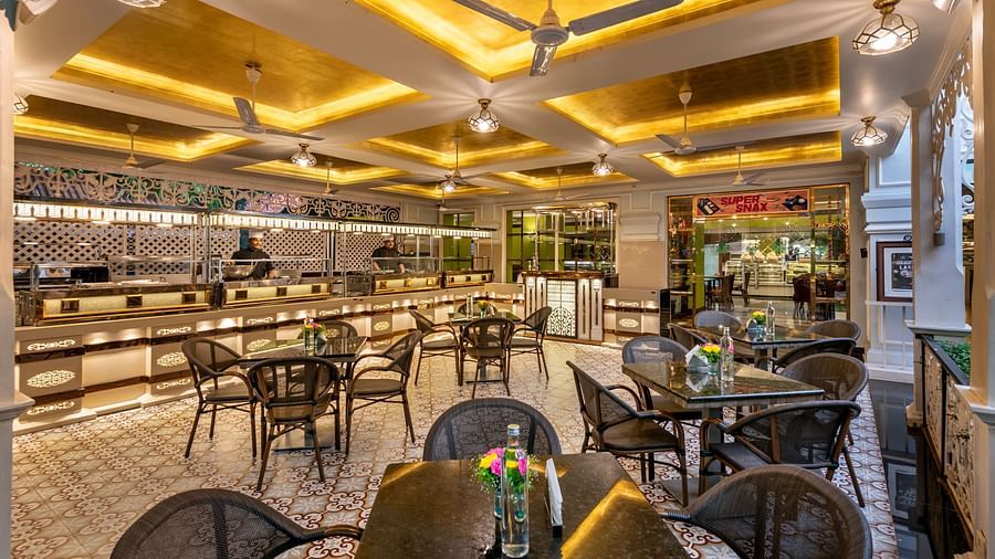 super snax 2 dining area with bright yellow ceiling lights- Mayfair Lagoon, Bhubaneswar 