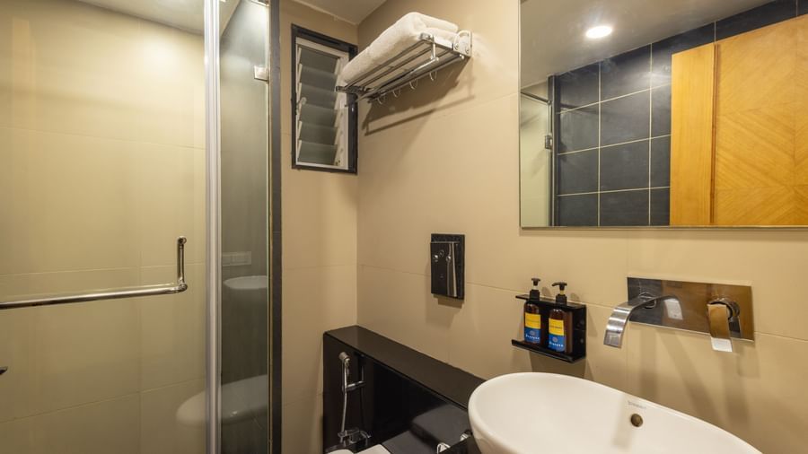 Bathroom of Pravasa Stay Vijay Nagar, Indore, featuring a separate shower area.