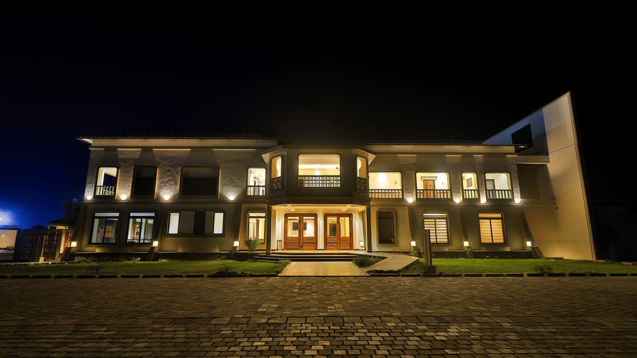 The main building of the resort illuminated beautifully against the night sky - Tathastu Chavri Resort, Jawai