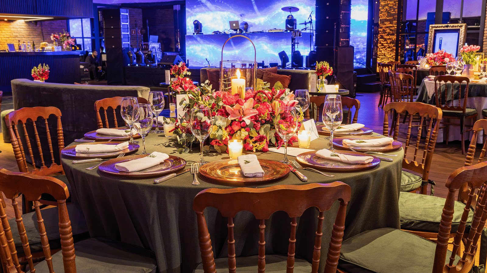 The hall, decorated with flowers and neatly set table for the festivities.