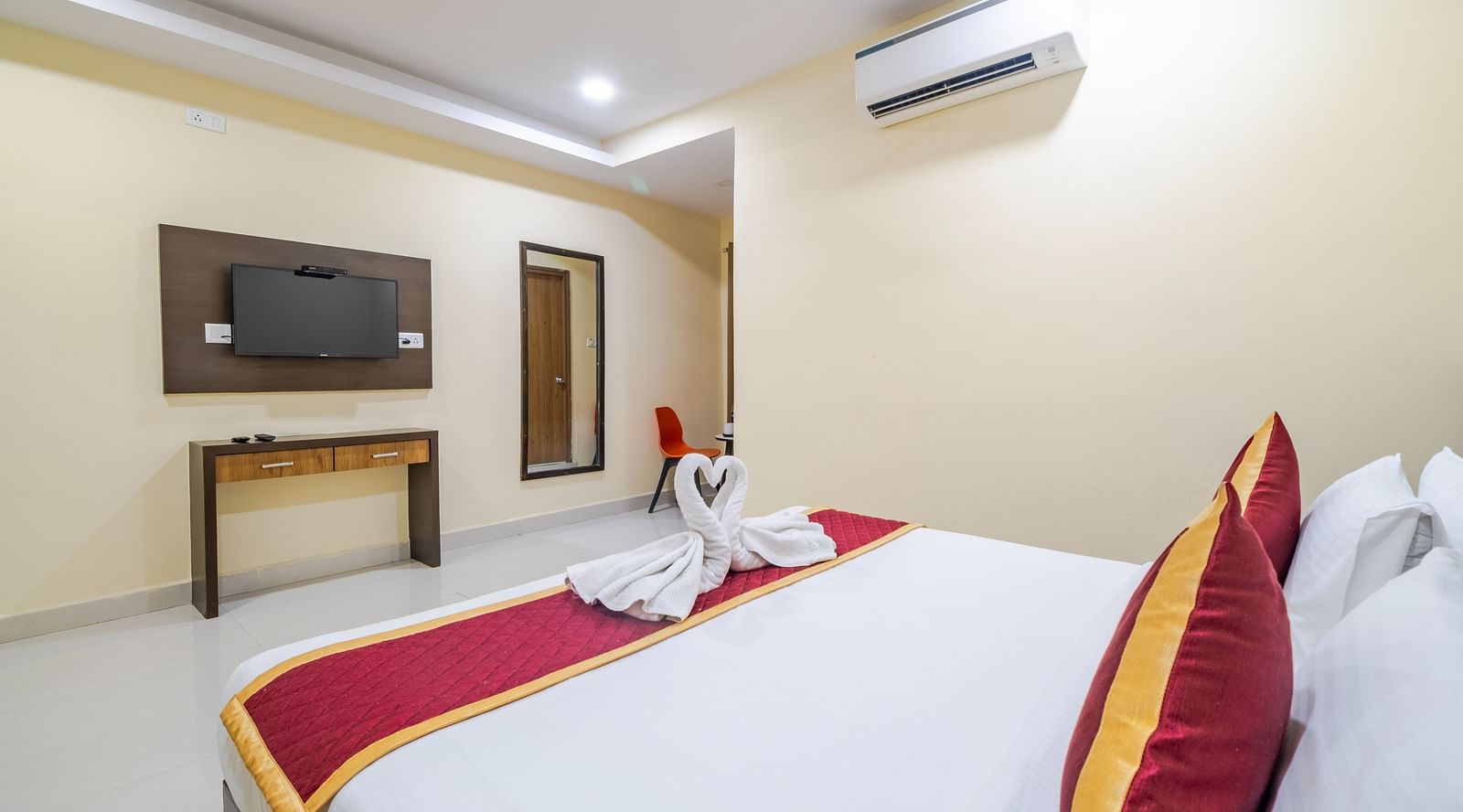 Executive room view with wall-mounted TV at Lemonridge Hotels.