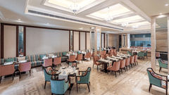 tables and chairs in our restaurant in Jalandhar - Park Plaza, Jalandhar