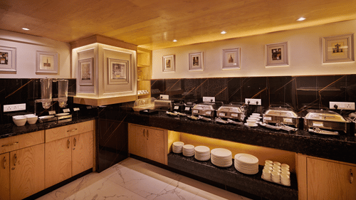 An image of the buffet area in our restaurant - Deventure Sarovar Portico, Patel Nagar