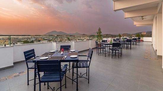 Seating arrangements at the Rooftop Sunset Restaurant - Maan Vilas by Stone Wood, Udaipur