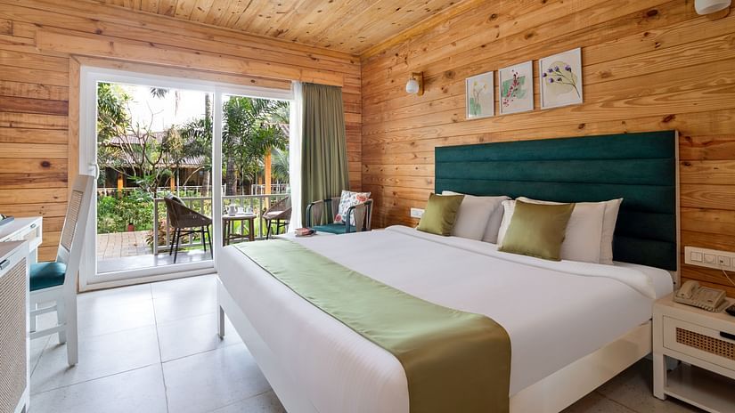 Lawn-view room featuring a cozy bed and air conditioning at Aralea Beach Resort by Stone Wood, Morjim