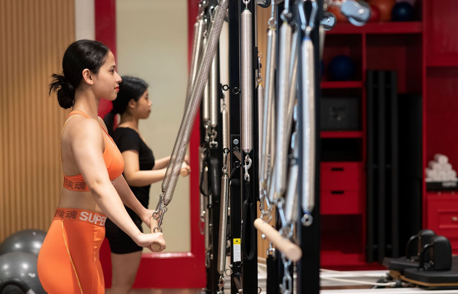 An image of women working out in the Pilates room - Claridges Collection