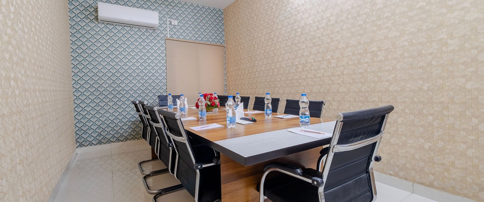 Boardroom setup with table and seating at Lemonridge Hotels