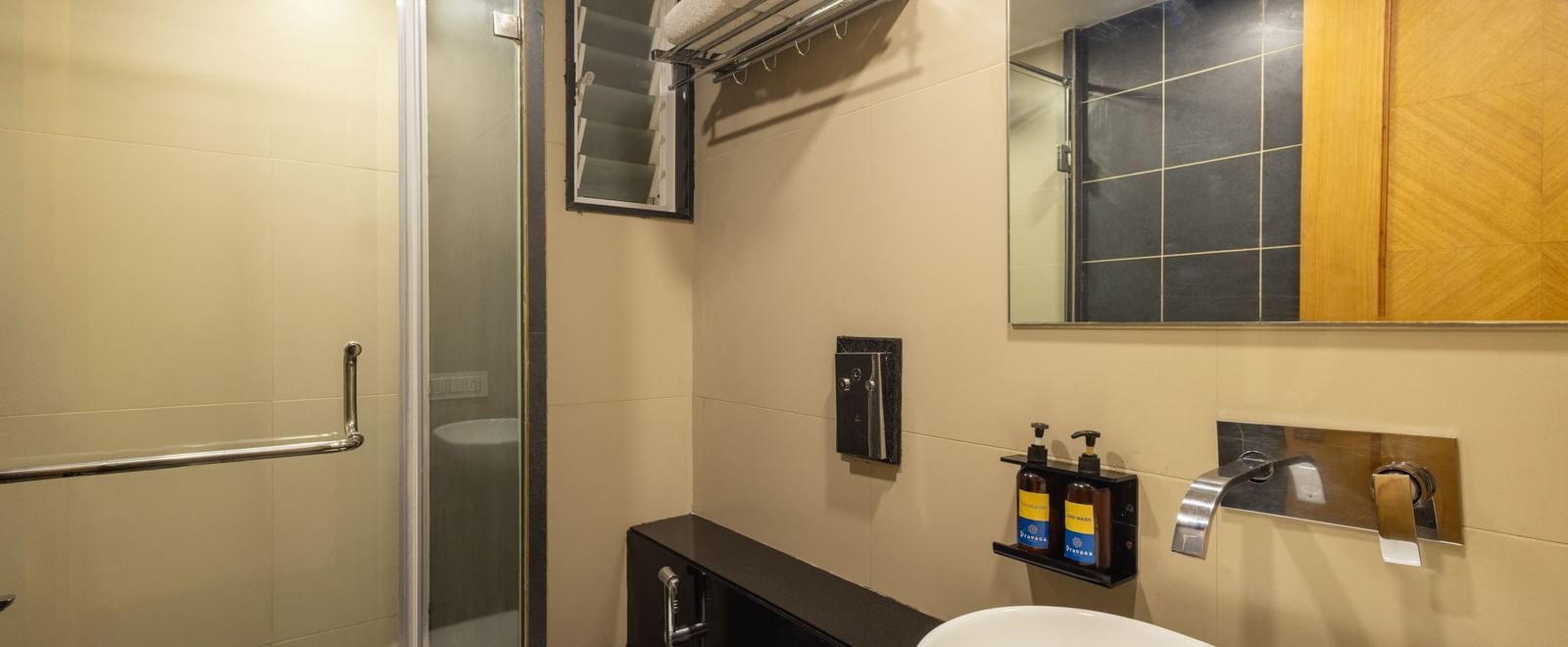 Bathroom of Pravasa Stay Vijay Nagar, Indore, featuring a separate shower area.