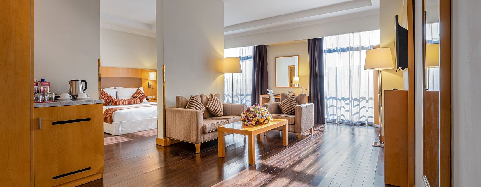An overview of a room with the bedroom and living room in view inside one of the rooms - Ramada by Wyndham Addis, Addis Ababa