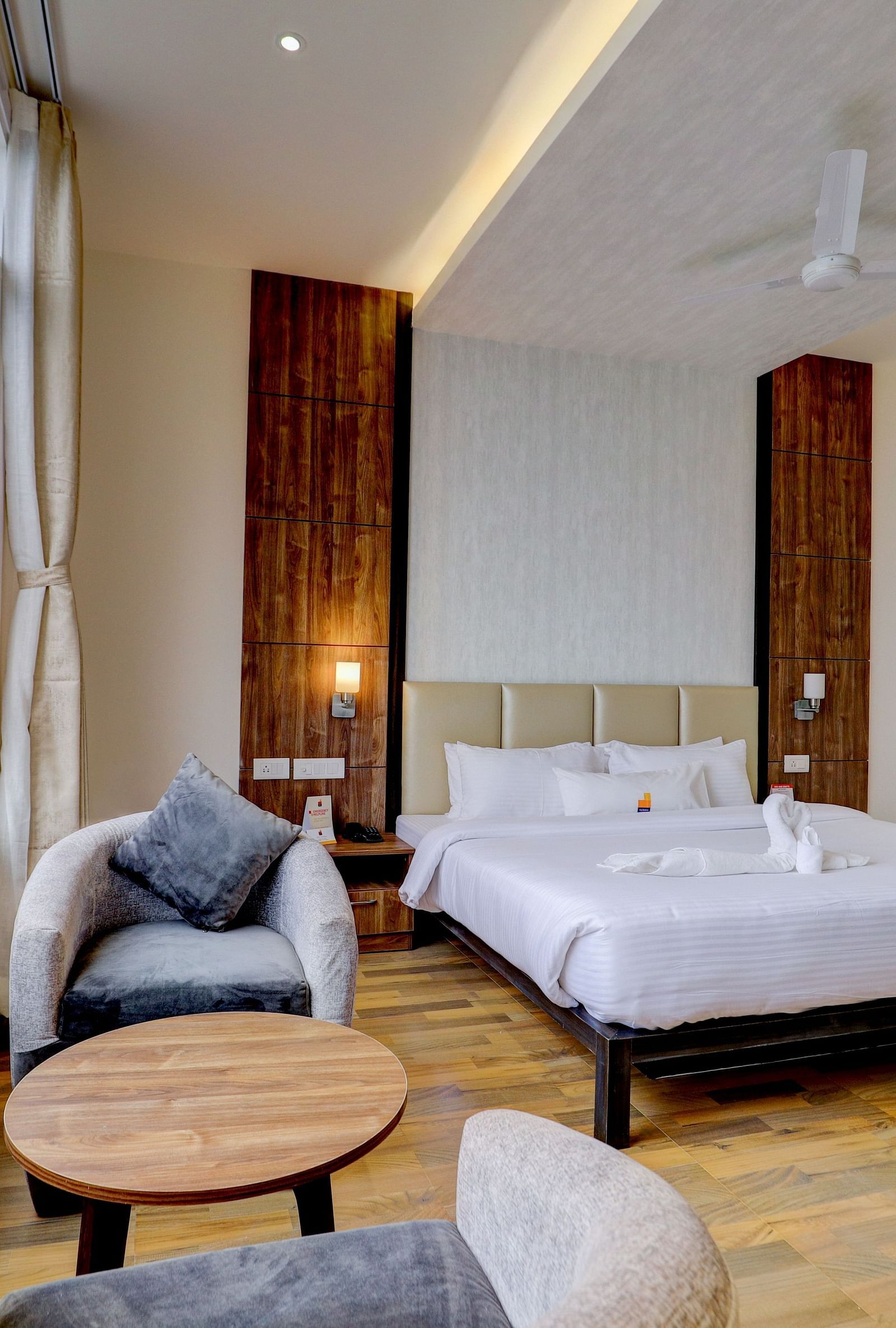 view of king size bed and TV of a Deluxe Room Banari Regency by Summit, Namchi