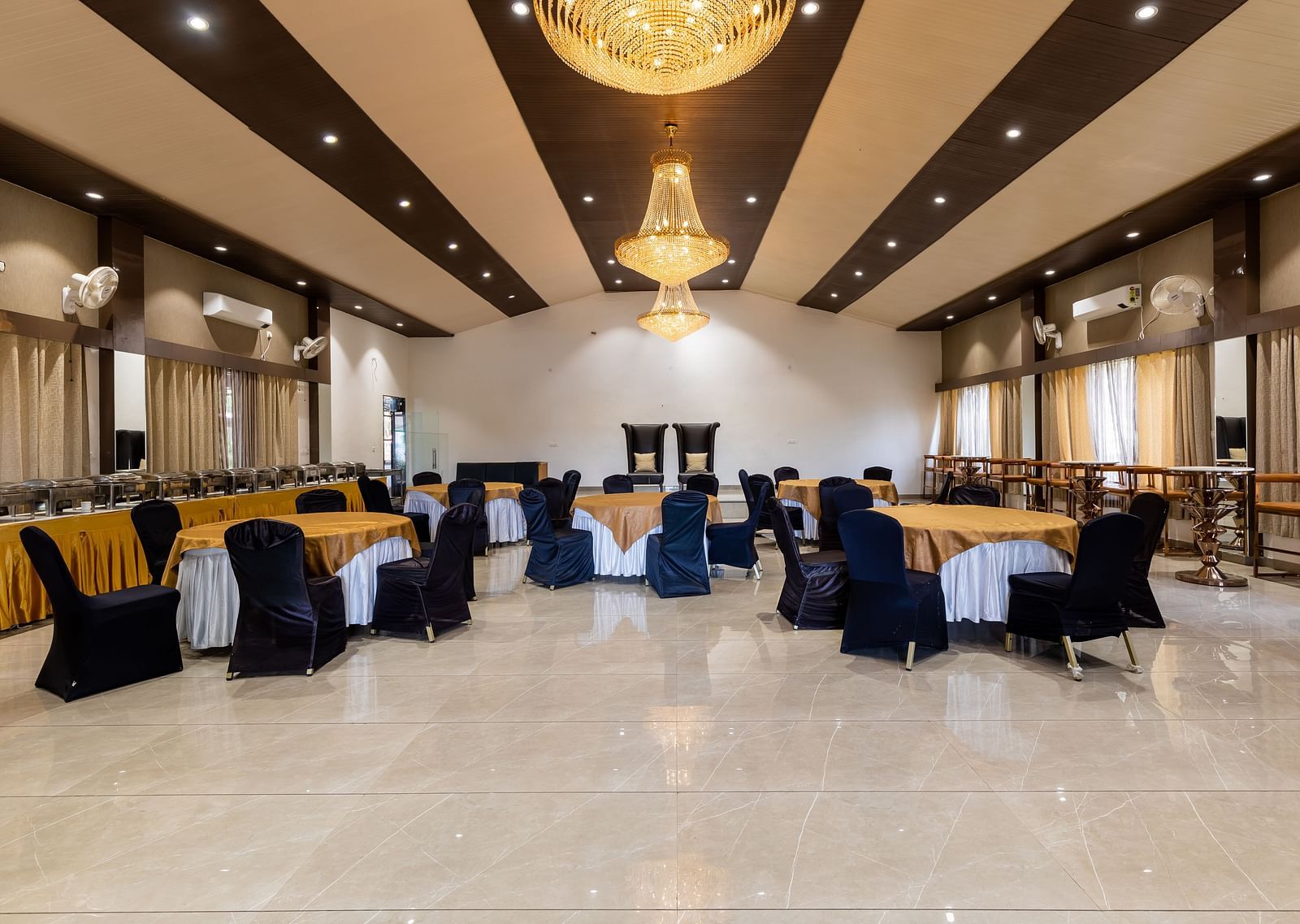 Seating arrangement in a banquet hall at TGI Hotels and Resorts