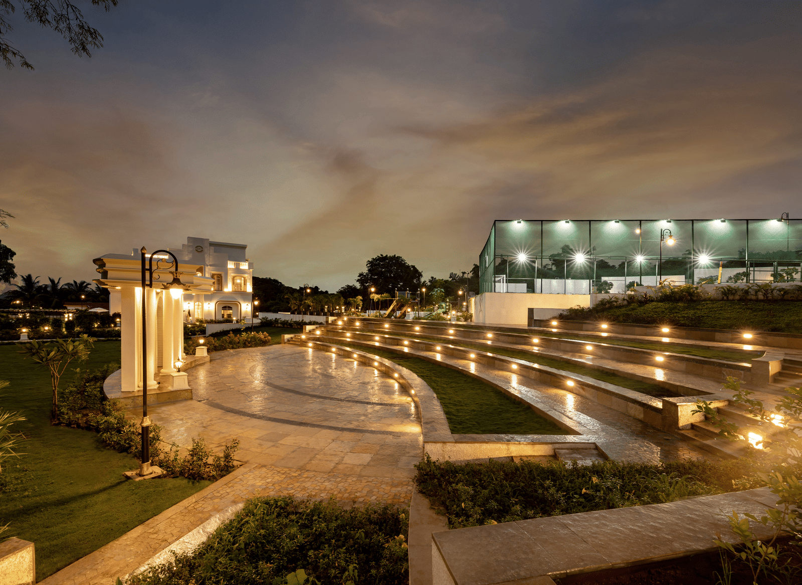 The amphitheatre at MIROS Hotel at the night with the bright exterior lights illuminating the area