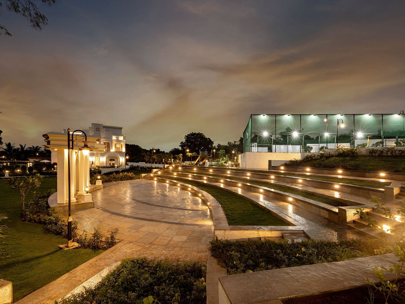 The Amphitheatre at Imperial Goa taken during the night with the bright exterior lights illuminating the area.