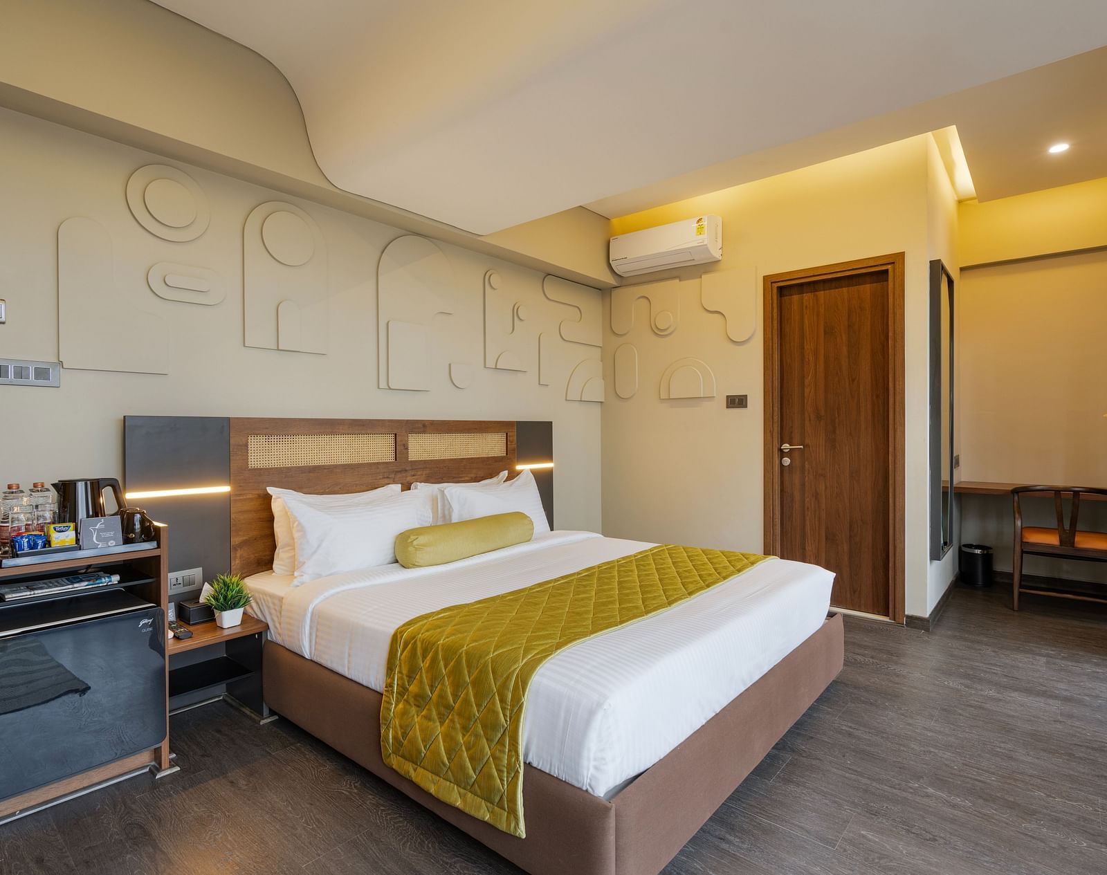 Citrus Room at Fressotel, Kanakapura Road, with a 240 sq. ft. space, air-conditioning, and a 40-inch Android TV.