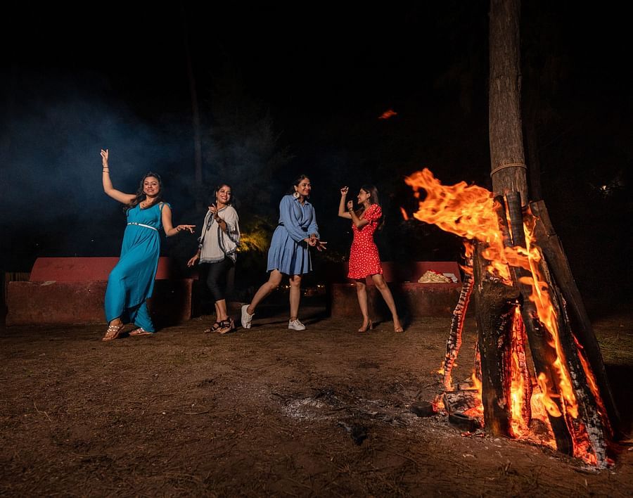 Lotus Eco beach resort, Bonfire with people dancing