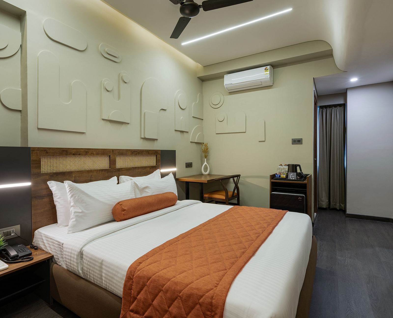 Elegant Tangerine Room offering modern amenities in a tranquil setting at Fressotel, Kanakapura Road.