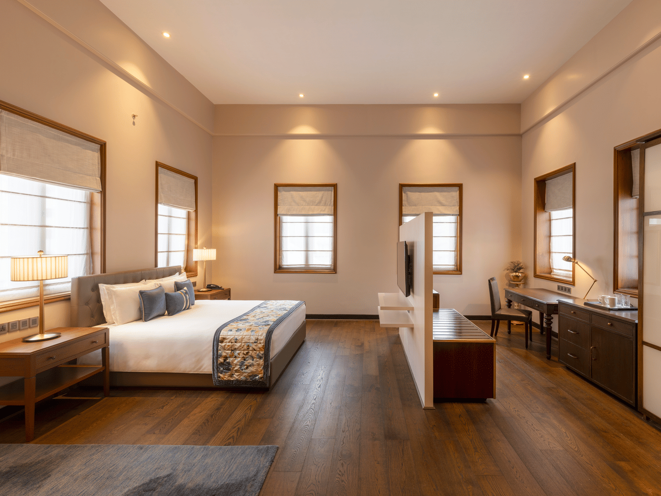 Premium Club Room with a bed, work desk and window view at Kenilworth Hotel, Kolkata.