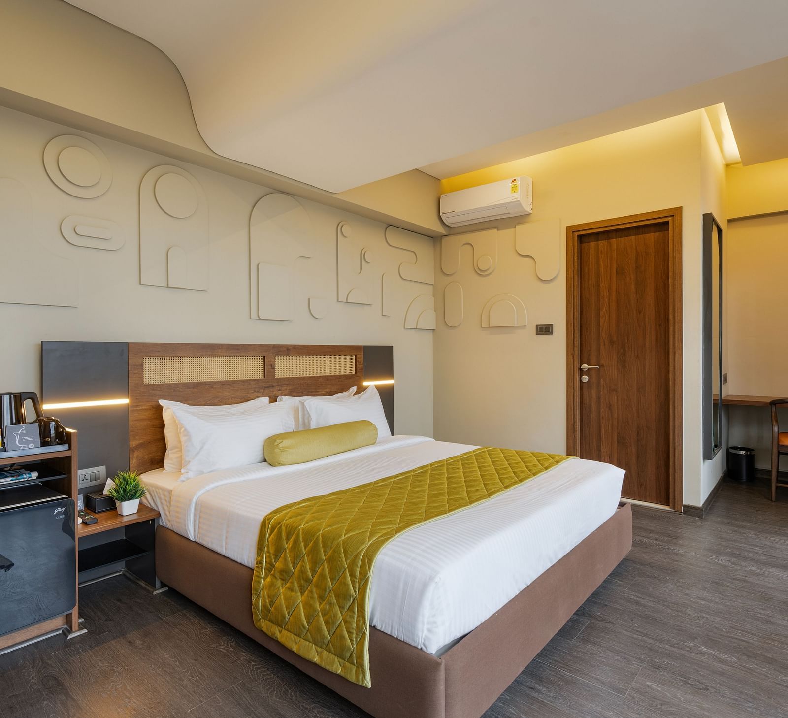 Citrus Room at Fressotel, Kanakapura Road, with a 240 sq. ft. space, air-conditioning, and a 40-inch Android TV.