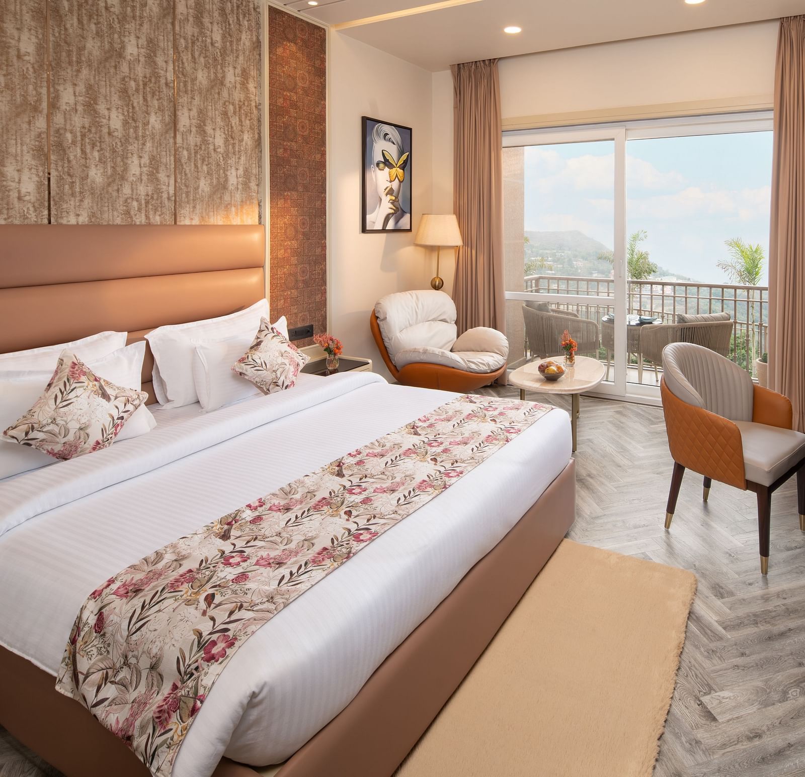 Superior room at Leisure hotel with double bed and sofa and TV at Mountoria Retreat, Naukuchiatal