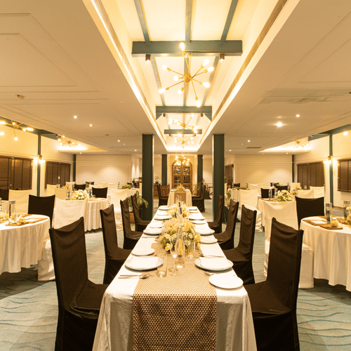 Anchorage - Refined dining room with white clothed tables set for a formal dinner in  Polo Floatel Kolkata