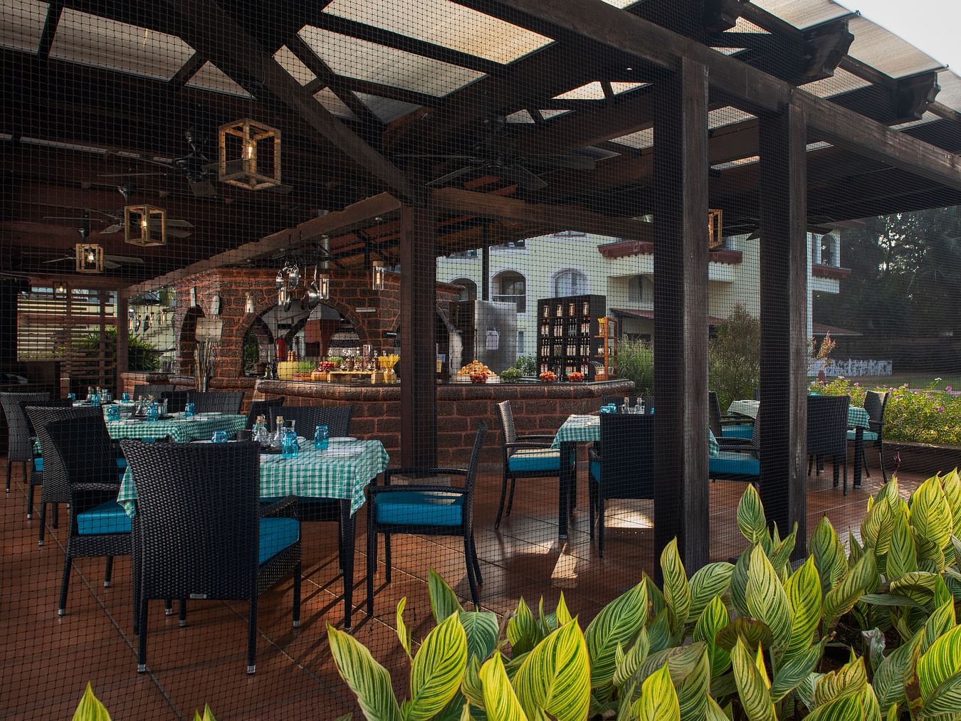 Our Italian restaurant in South Goa, Salute, looks welcoming with its outdoor seating facility and  lush furnishing