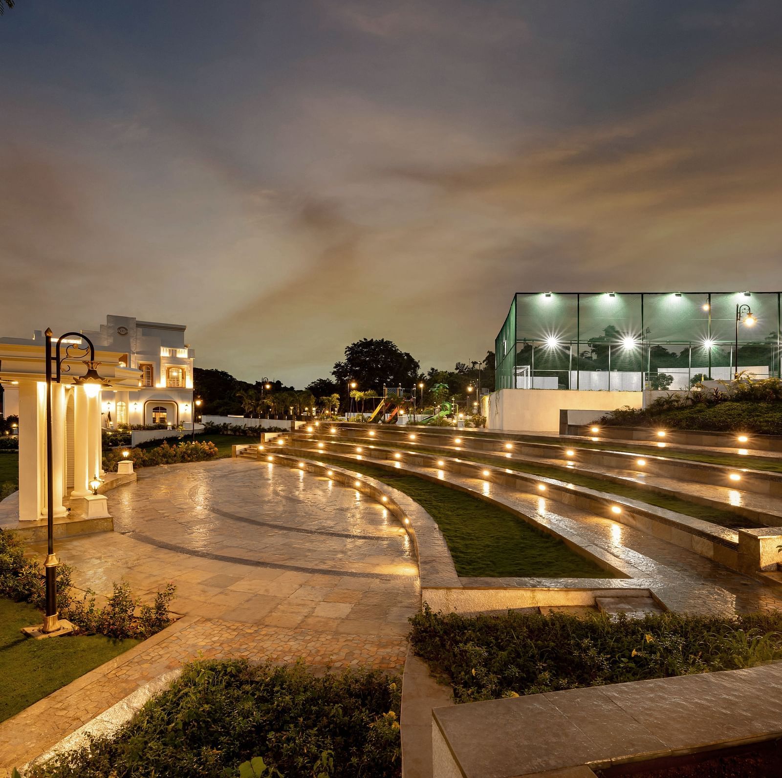 The Amphitheatre at Imperial Goa taken during the night with the bright exterior lights illuminating the area.