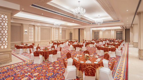 tables and chairs set up in a cluster arrangement in our banquet hall in jalandhar - Park Plaza, Jalandhar