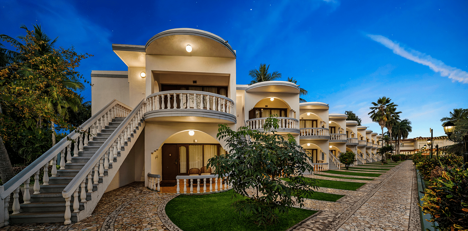 A facade image River View Room with balcony showcasing the trail that leads the way to other rooms - GReaT Trails River View Resort Thanjavur By GRT Hotels