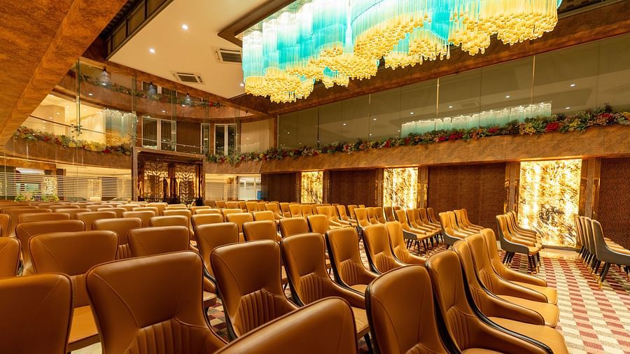an image of an event space with chairs evenly arranged for a function at Clarks Inn Suites Hyderabad