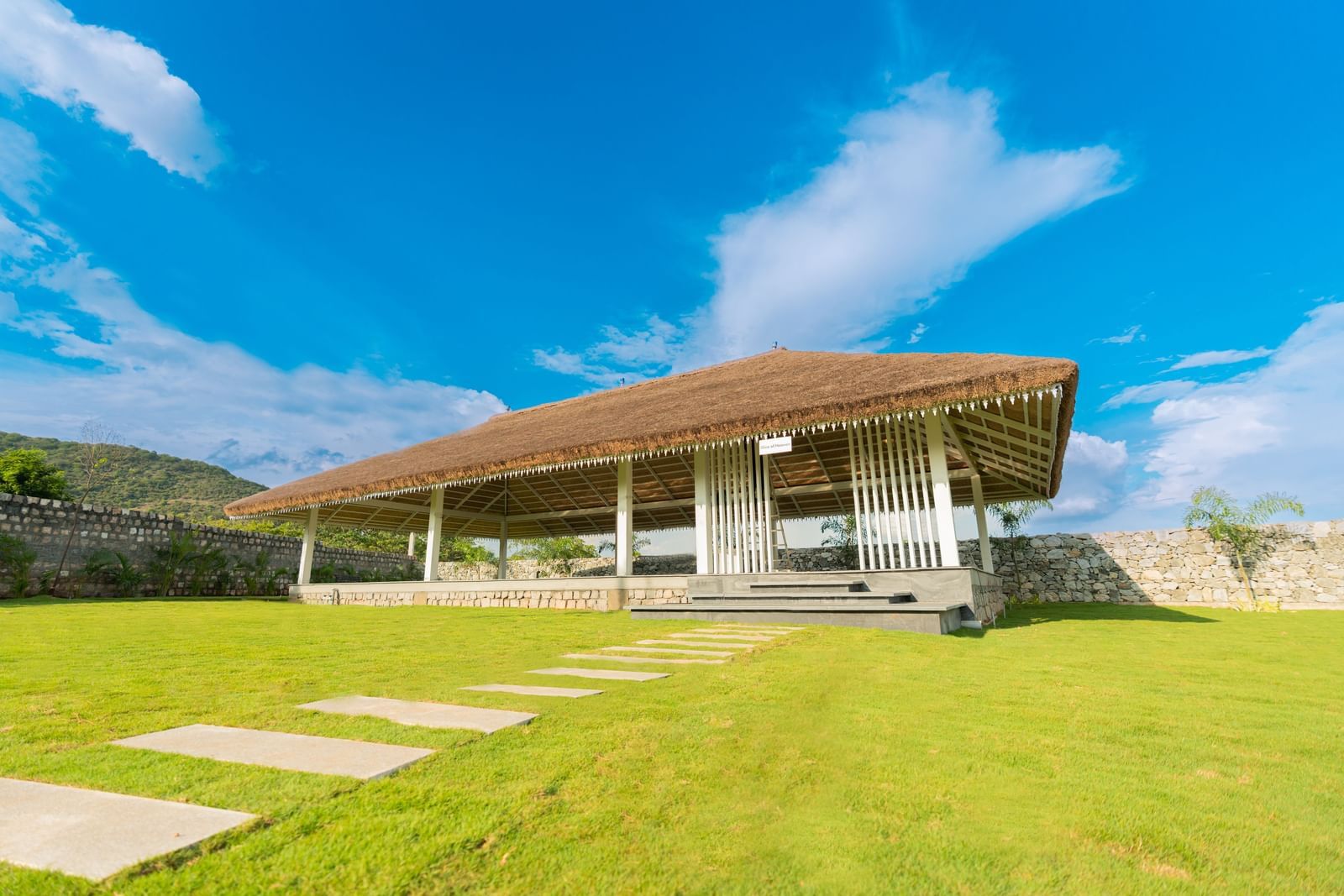 Slice of heaven venue hall with clear blue sky in the background at Darza Resorts.