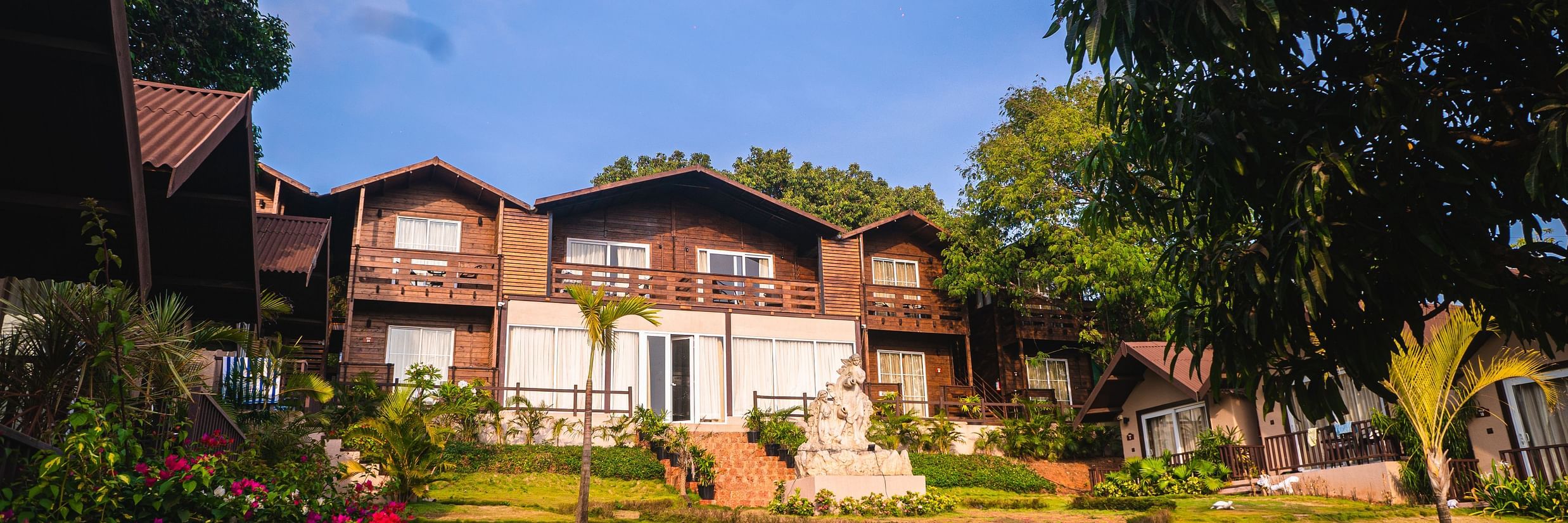 The cottages at Stone Wood Resort & Spa embraced by trees and greenery  2