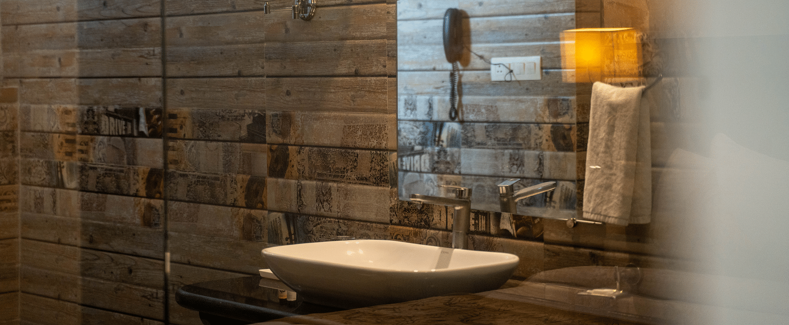 Modern bathroom with a stylish sink and warm lighting - Hotel Udai Median, Udaipur.
