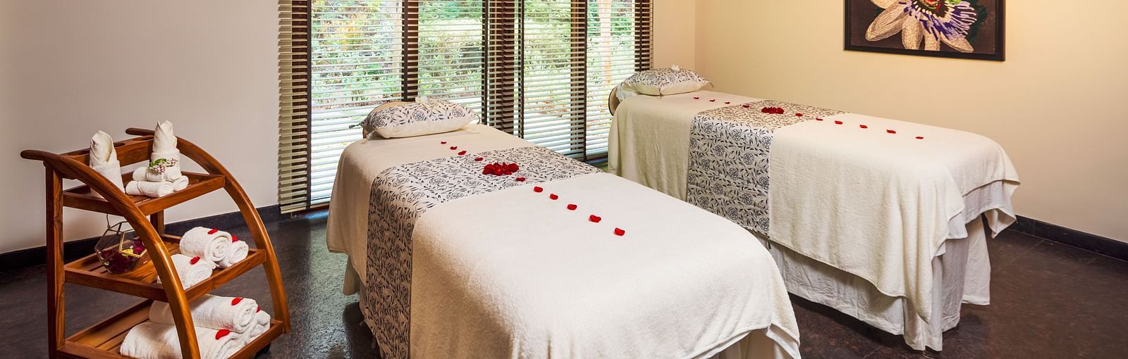 A massage room with two massage tables for couples massage - Gamyam Retreat
