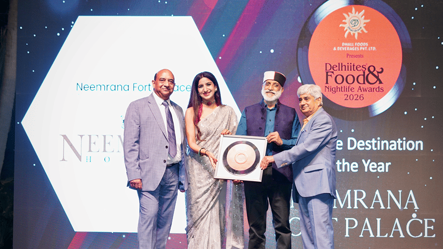 The representatives of Neemrana Fort-Palace accepting the 'Destination of the Year' award at the 2026 Delhiites Food & Nightlife Awards.