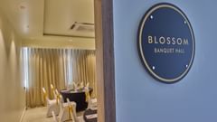 A wall-mounted signboard indicating the name of the banquet hall at our hotel