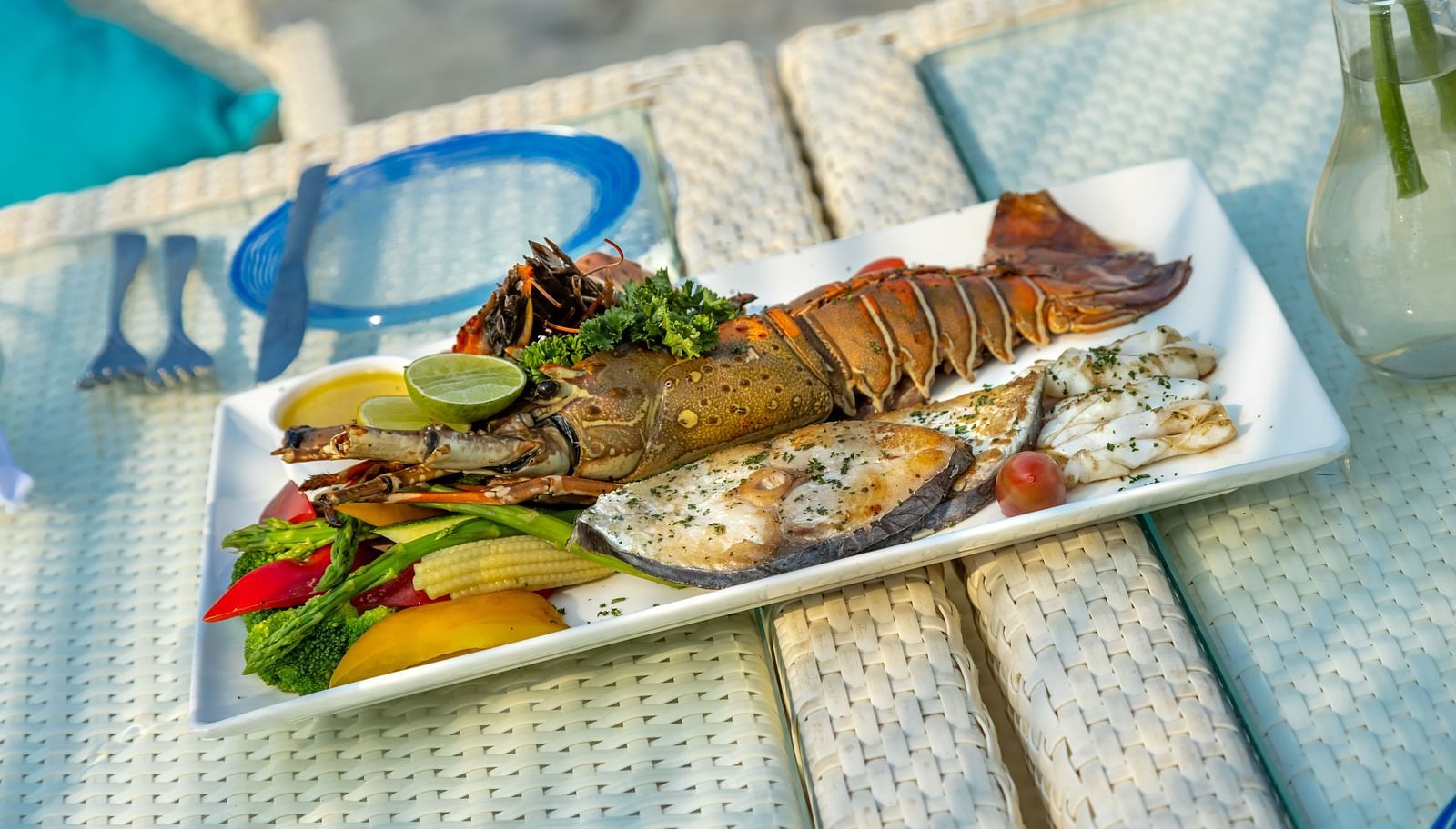 a plate full of sea food kept on a table - Caravela Beach Resort Goa