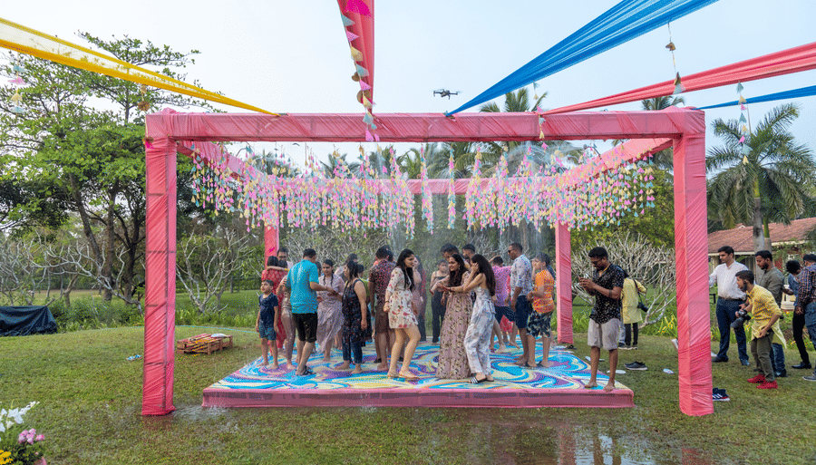  people dancing on a decorated tent area - Caravela Beach Resort Goa