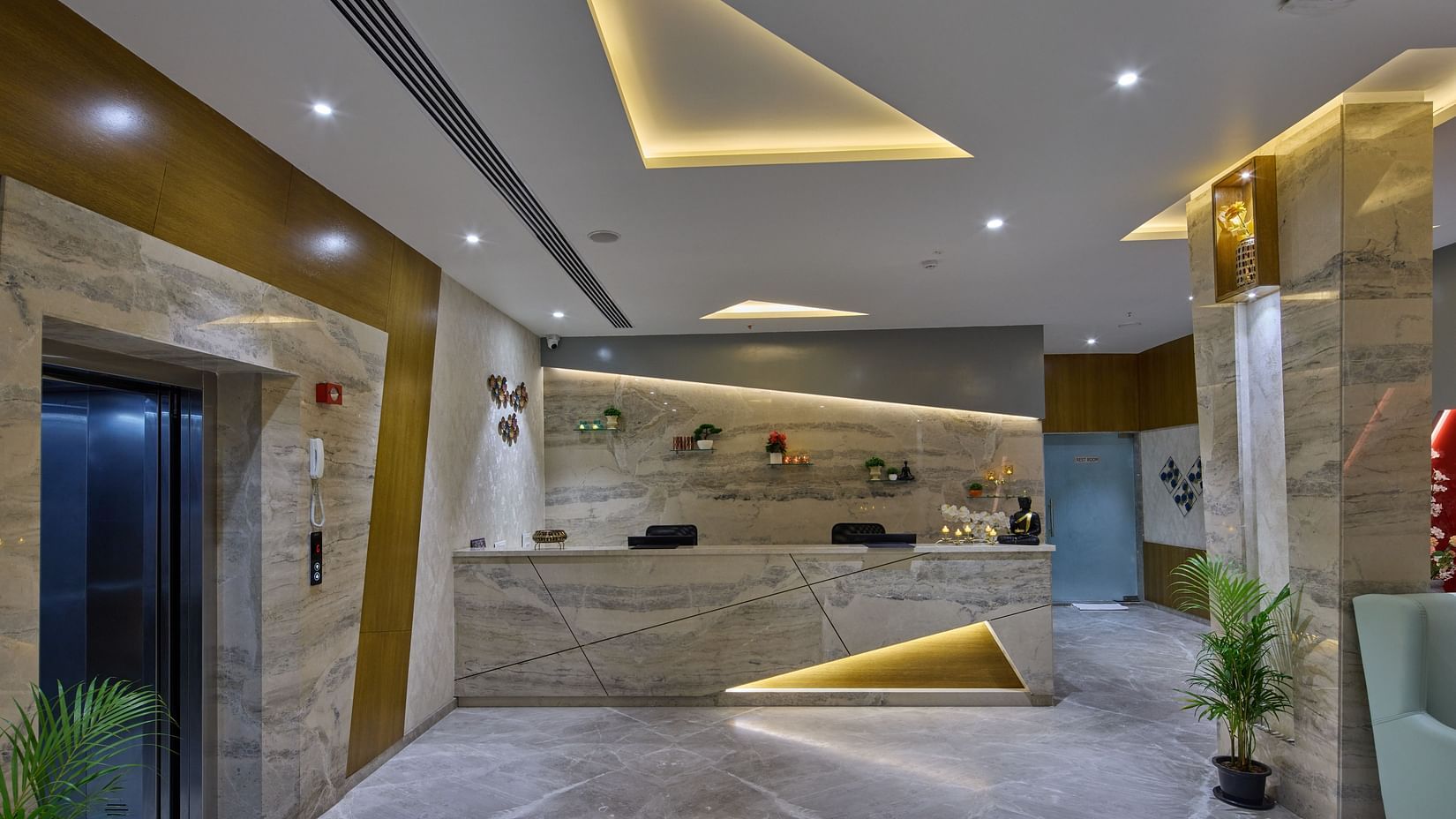 Reception with the lights on at Grand Continent - A Sarovar Premiere Affiliate Hotel, Hosur