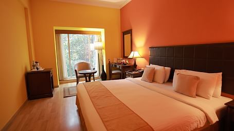 The bedroom of the Superior Park View rooms in Bangalore 3