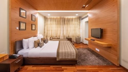 close-up side view of the king size bed in the Russel Suite at Kenilworth Hotel, Kolkata